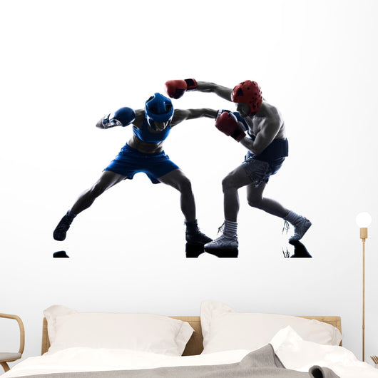 Male and female boxers working out Wall Mural